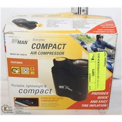 COMPACT AIR COMPRESSOR IN BOX.