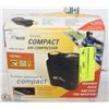 Image 1 : COMPACT AIR COMPRESSOR IN BOX.