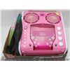 Image 1 : PINK KARAOKE MACHINE WITH MIC AND DISKS.