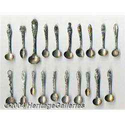 A GROUP OF TWENTY MINIATURE SOUVENIR SPOONS