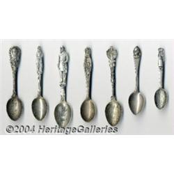 A GROUP OF SEVEN SILVER MILITARY SOUVENIR SPOONS