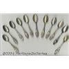 Image 1 : A GROUP OF ELEVEN SILVER FRUIT HANDLE SOUVENIR SPOONS