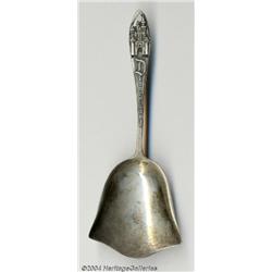 A SILVER DISNEYLAND SOUVENIR NUT SCOOP