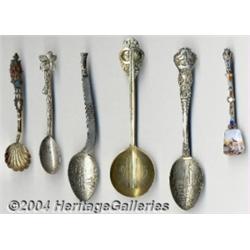 A GROUP OF FIVE SILVER SOUVENIR SPOONS