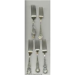 A GROUP OF FIVE SILVER SOUVENIR FORKS