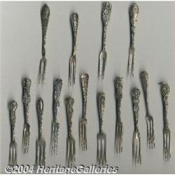 A GROUP OF FIFTEEN SILVER BERRY SOUVENIR FORKS