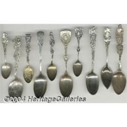 A GROUP OF TEN SILVER PERSONALITY SOUVENIR SPOONS
