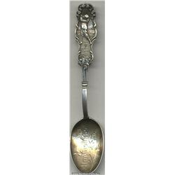 A SILVER GOLF SOUVENIR SPOON