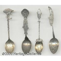 A GROUP OF FOUR MARINE LIFE SOUVENIR SPOONS