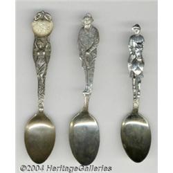 A GROUP OF THREE SILVER FIGURAL SOUVENIR SPOONS