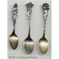 A GROUP OF THREE SILVER FIGURAL SPOONS