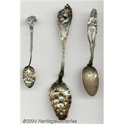 A GROUP OF THREE SILVER FIGURAL SPOONS
