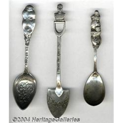 A GROUP OF THREE SILVER FIGURAL SPOONS