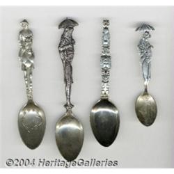 A GROUP OF FOUR FIGURAL SOUVENIR SPOONS