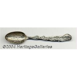 A SILVER HAWAIIAN WAIKIKI SKYLINE SOUVENIR SPOON