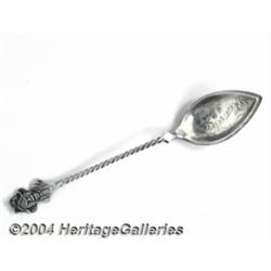 A SILVER BLACK AMERICANA SOUVENIR CITRUS SPOON
