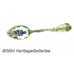 A SILVER AND ENAMEL BLACK AMERICANA SOUVENIR SPOON