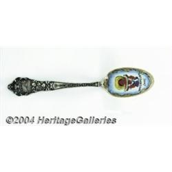 A SILVER AND ENAMEL BLACK AMERICANA SOUVENIR SPOON