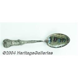 A SILVER AND ENAMEL BLACK AMERICANA SOUVENIR SPOON