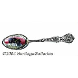 A SILVER AND ENAMEL BLACK AMERICANA SOUVENIR SPOON