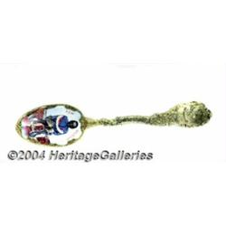 A SILVER AND ENAMEL BLACK AMERICANA SOUVENIR SPOON