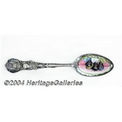 A SILVER AND ENAMEL BLACK AMERICANA SOUVENIR SPOON