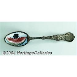 A SILVER AND ENAMEL BLACK AMERICANA SOUVENIR SPOON