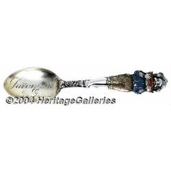 A SILVER AND ENAMEL BLACK AMERICANA SOUVENIR SPOON