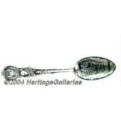 A SILVER AND ENAMEL BLACK AMERICANA SOUVENIR SPOON