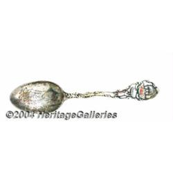 A SILVER AND ENAMEL BLACK AMERICANA SOUVENIR SPOON