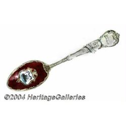 A SILVER AND ENAMEL MISSOURI SOUVENIR SPOON