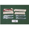 Image 1 : 8 VINTAGE NOS METEOR & BEL-AIR EMBLEMS