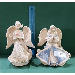 TWO WINDUP MUSICAL ANGEL FIGURINES