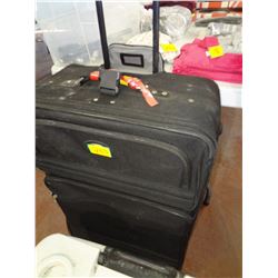 black american tourister suitcase