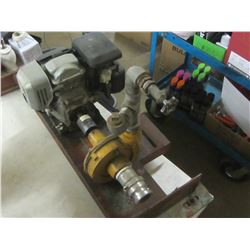 2 inch Honda water pump / has garden hose fitting to be used from dugout