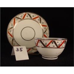 Handleless Iron Red & Gold Cup & Saucer