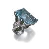 Image 1 : AN AQUAMARINE, GREEN GARNET AND DIAMOND RING