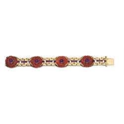 AN UNUSUAL ART DECO GOLD, CARNELIAN AND AMETHYST BRACELET, CA. 1935