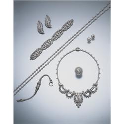 A PLATINUM AND DIAMOND LONGCHAIN 