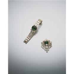 A FINE EMERALD AND DIAMOND BROOCH