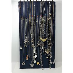 2 - LOT OF 24 PENDANTS ON CHAINS