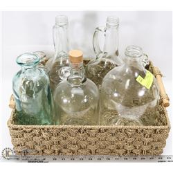 BASKET OF VINTAGE GLASS JUGS AND BOTTLES