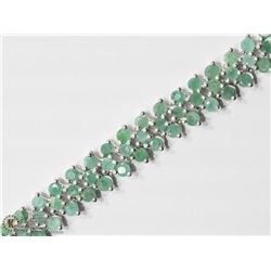 31) STERLING SILVER 144 EMERALD BRACELET