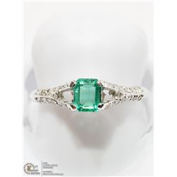48) 14K WHITE GOLD EMERALD AND DIAMOND RING
