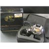 Image 1 : New Johnny Morris Bait Cast Reel / missing side cap / $ 199.99 tags