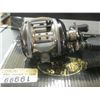 Image 4 : New Johnny Morris Bait Cast Reel / missing side cap / $ 199.99 tags