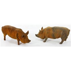 Two Large Cast Iron Pigs