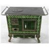 Image 2 : Cast Iron Stove with Floral Tile Trim
