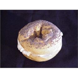 David Gilhooly (b. 1943) Canadian, POPPYSEED BAGEL, 1980, painted and glazed ceramic, 4" diamet...