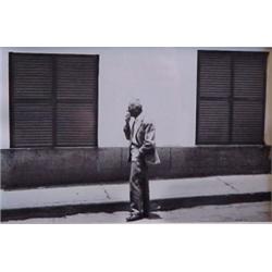 Paul Selwyn (20th Century) American, MAN ON THE STREET, black and white photograph, 14 x 11", f...